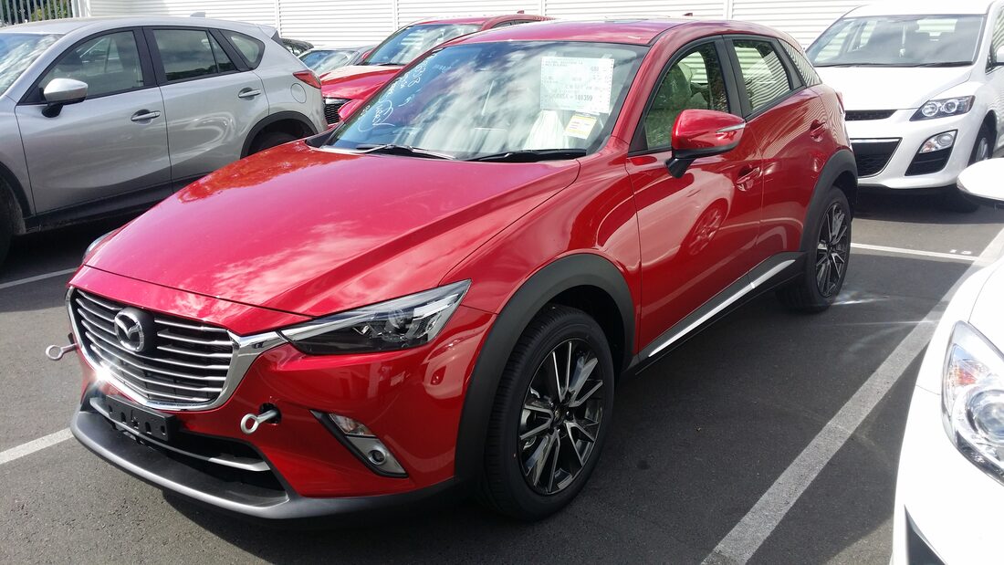 Red Mazda CX-3 (DK), front three-quarter