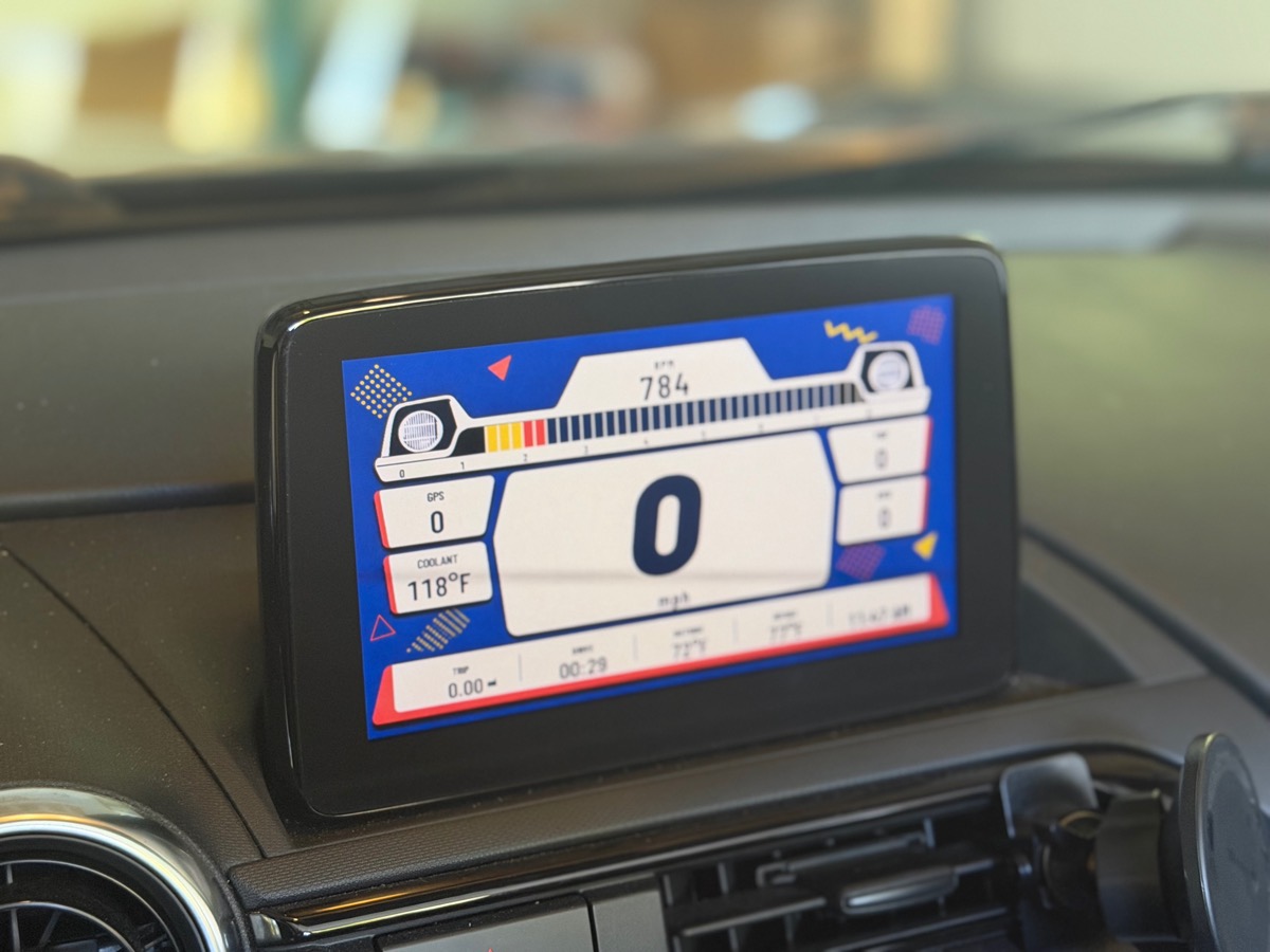 The factory Mazda Connect screen in an ND MX-5 showing a Meters gauge theme